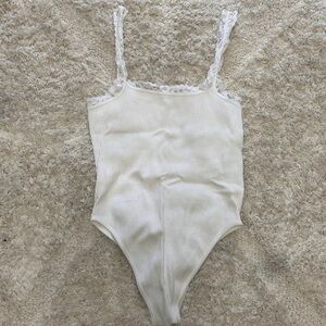 Woman’s White Lace Trim Bodysuit